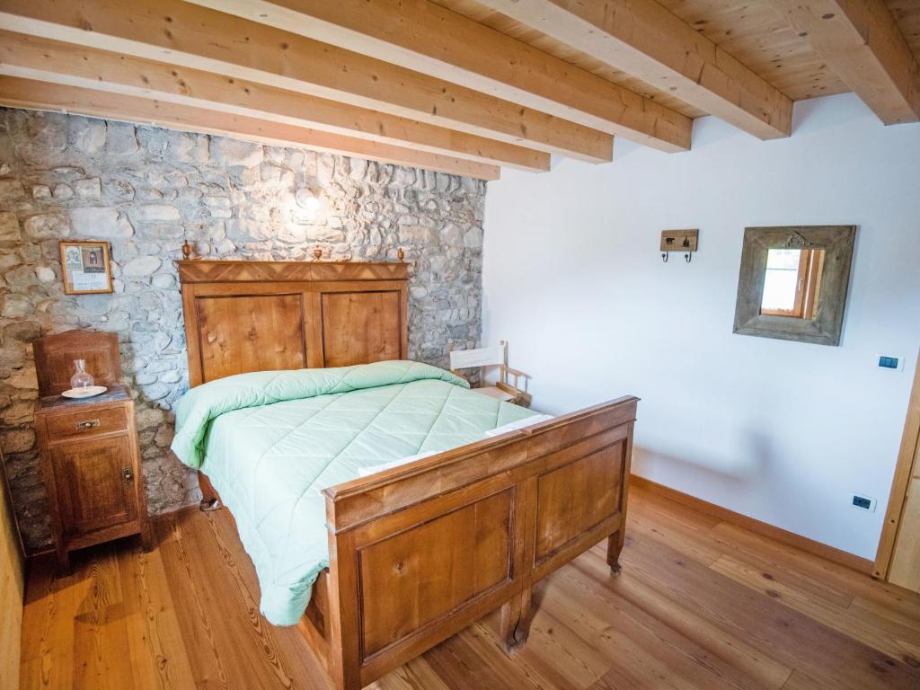 Postel nebo postele na pokoji v ubytování Apartment Albergo Diffuso - Cjasa Ustin-5 by Interhome