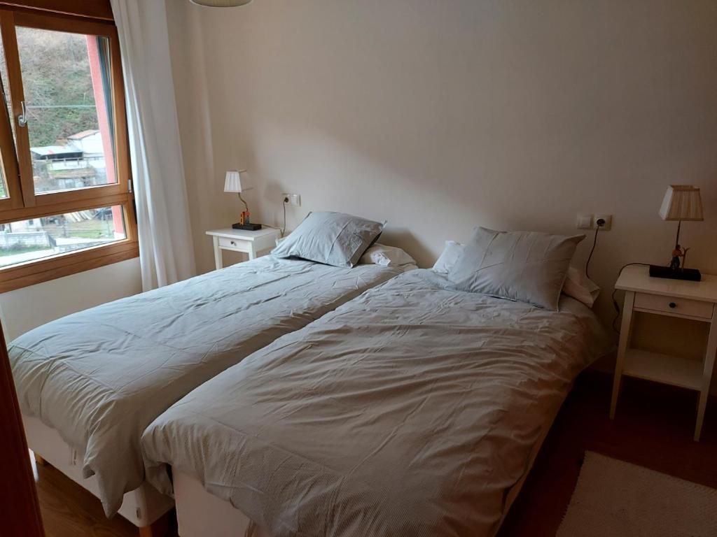 A bed or beds in a room at Los Molinos