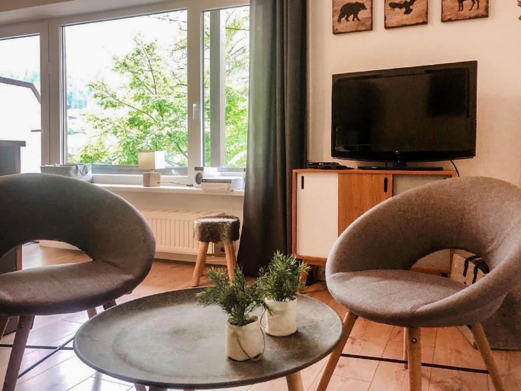 Area tempat duduk di Apartment Monte Grau Top 5 by Interhome