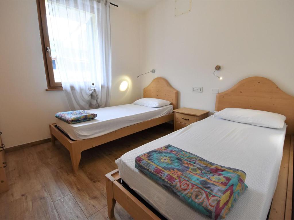 Posteľ alebo postele v izbe v ubytovaní Apartment Comfort-10 by Interhome