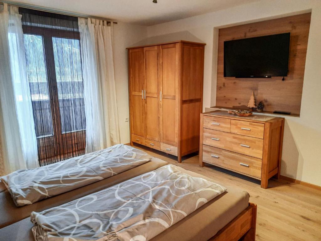 Posteľ alebo postele v izbe v ubytovaní Apartment Anna by Interhome