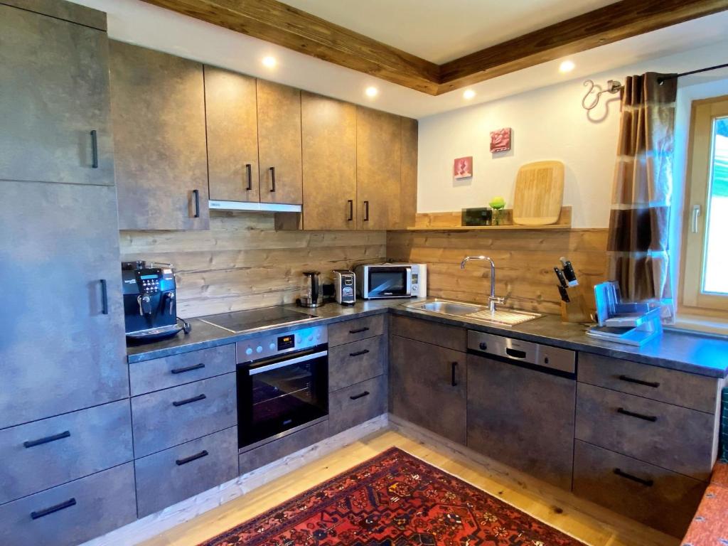 Kuchyň nebo kuchyňský kout v ubytování Apartment Manuel by Interhome