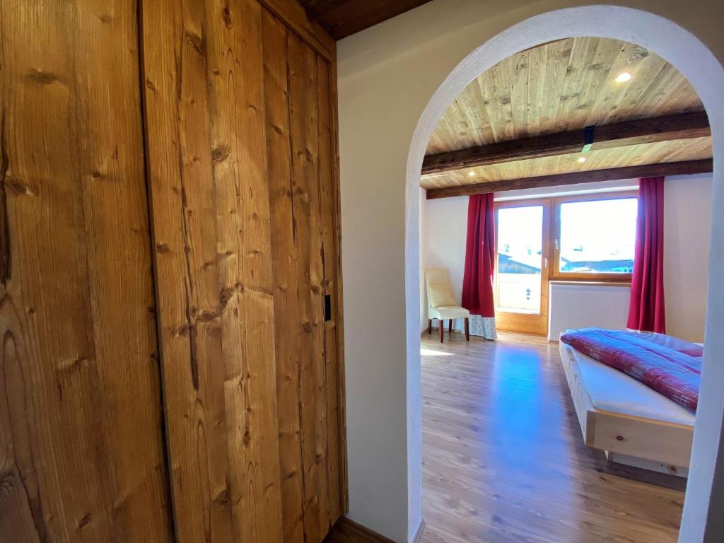 Postel nebo postele na pokoji v ubytování Apartment Manuel by Interhome