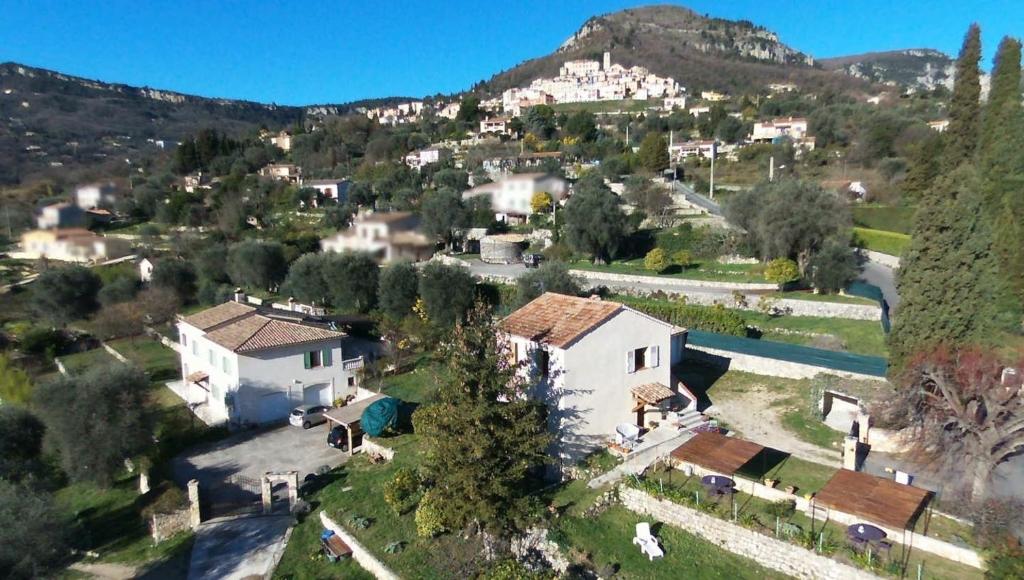 an aerial view of a village with a mountain at 2 Bed Apartment Sleeps 6 - Pets Ok - Free Parking in Le Bar-sur-Loup