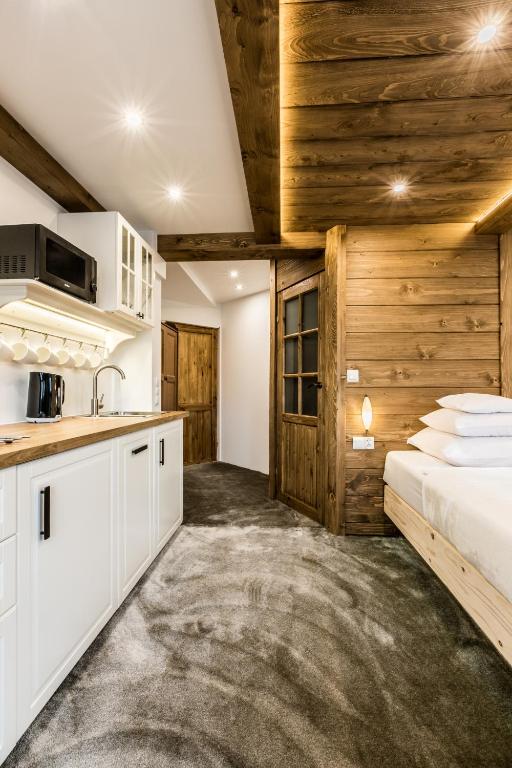 Posteľ alebo postele v izbe v ubytovaní Apartamenty Szymaszkowa