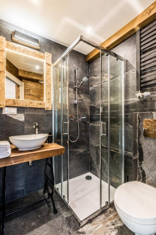Kúpeľňa v ubytovaní Apartamenty Szymaszkowa
