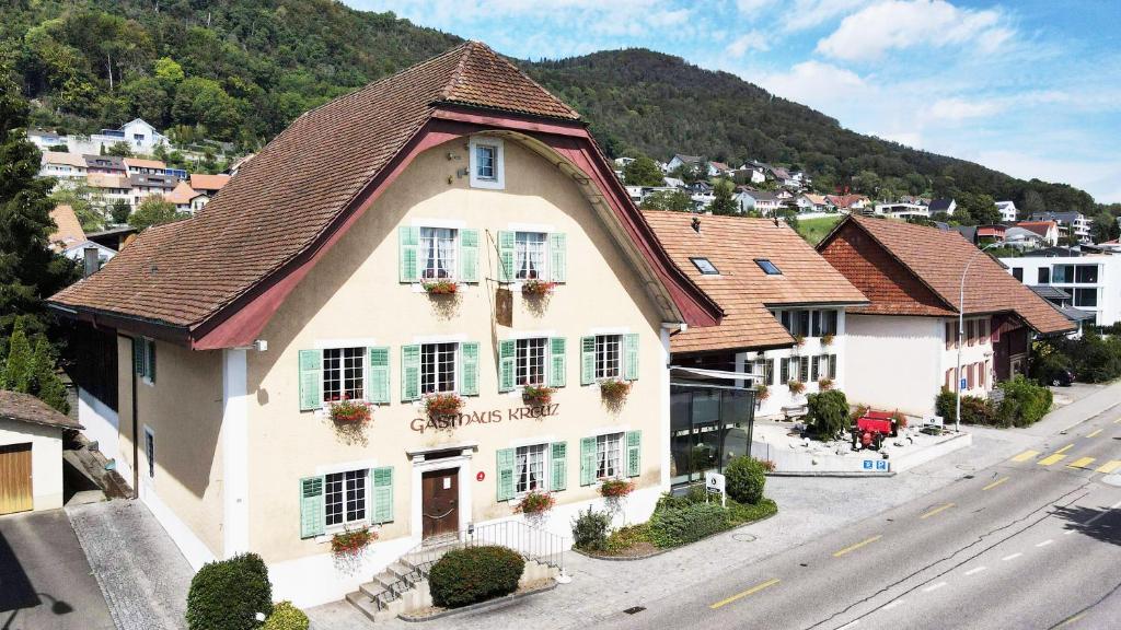 an aerial view of a house in a town at Gasthof Kreuz Egerkingen in Egerkingen