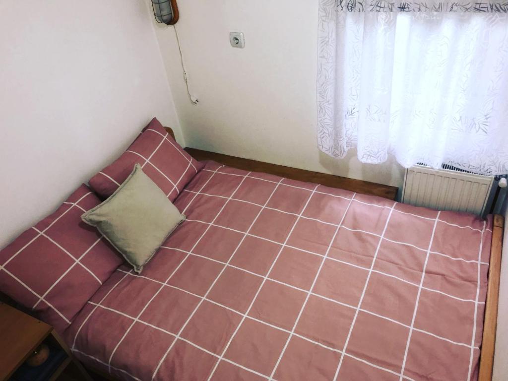 Postel nebo postele na pokoji v ubytování Jefimija