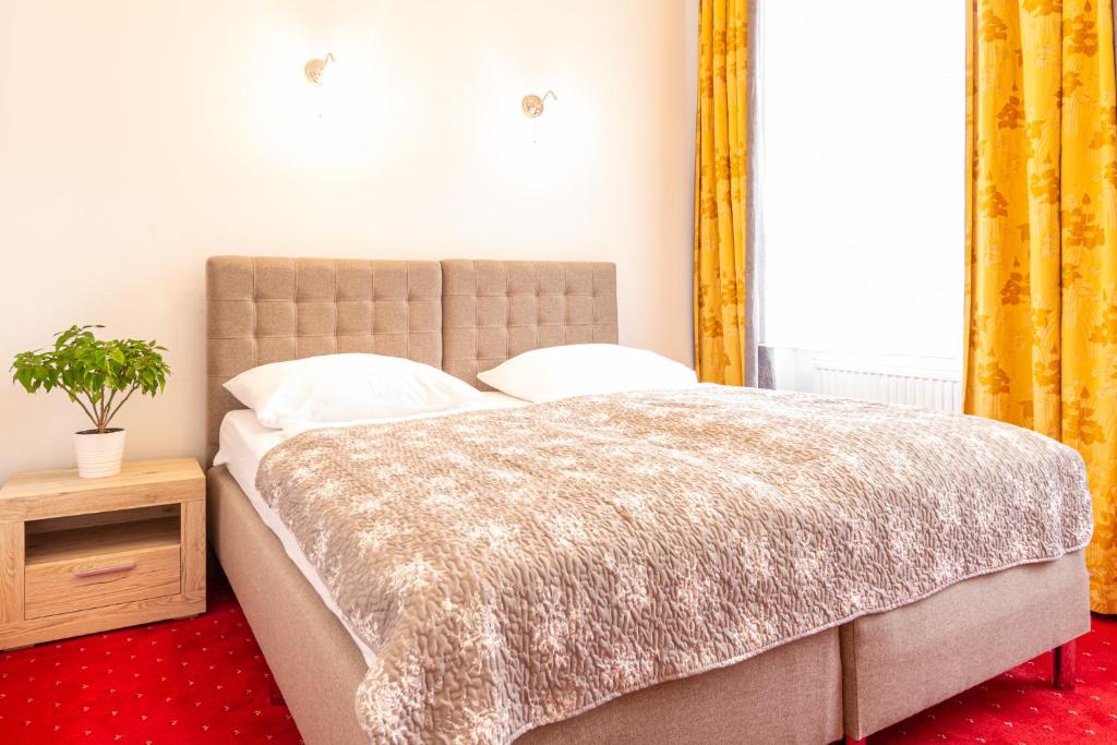 Katil atau katil-katil dalam bilik di Hotel Klimt