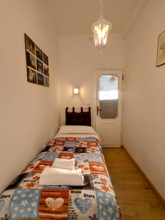Posteľ alebo postele v izbe v ubytovaní LA GUGLIA - Guglia House-CANNAREGIO-VENEZIA