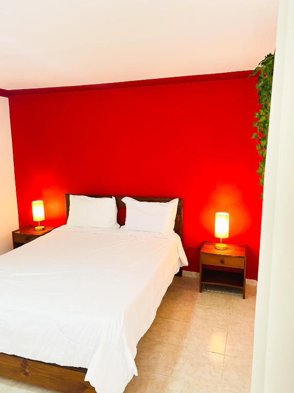 Letto o letti in una camera di LUTIX HOTELS