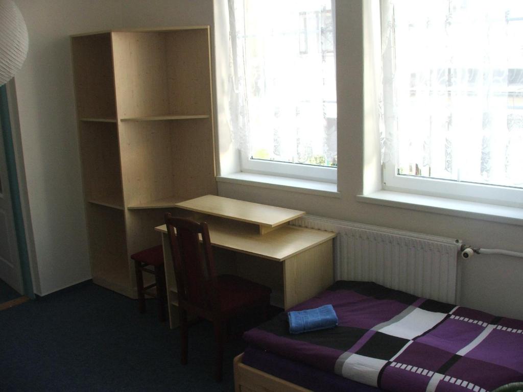 Postel nebo postele na pokoji v ubytování Prázdninový dům Josefův Důl