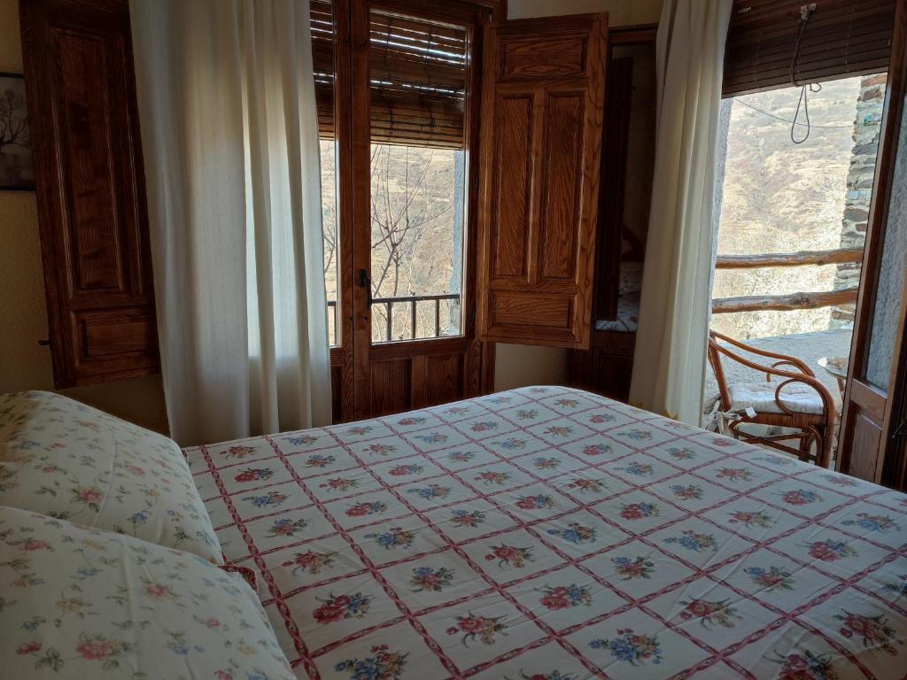Postel nebo postele na pokoji v ubytování Casa Alpujarreña Fina Número 27