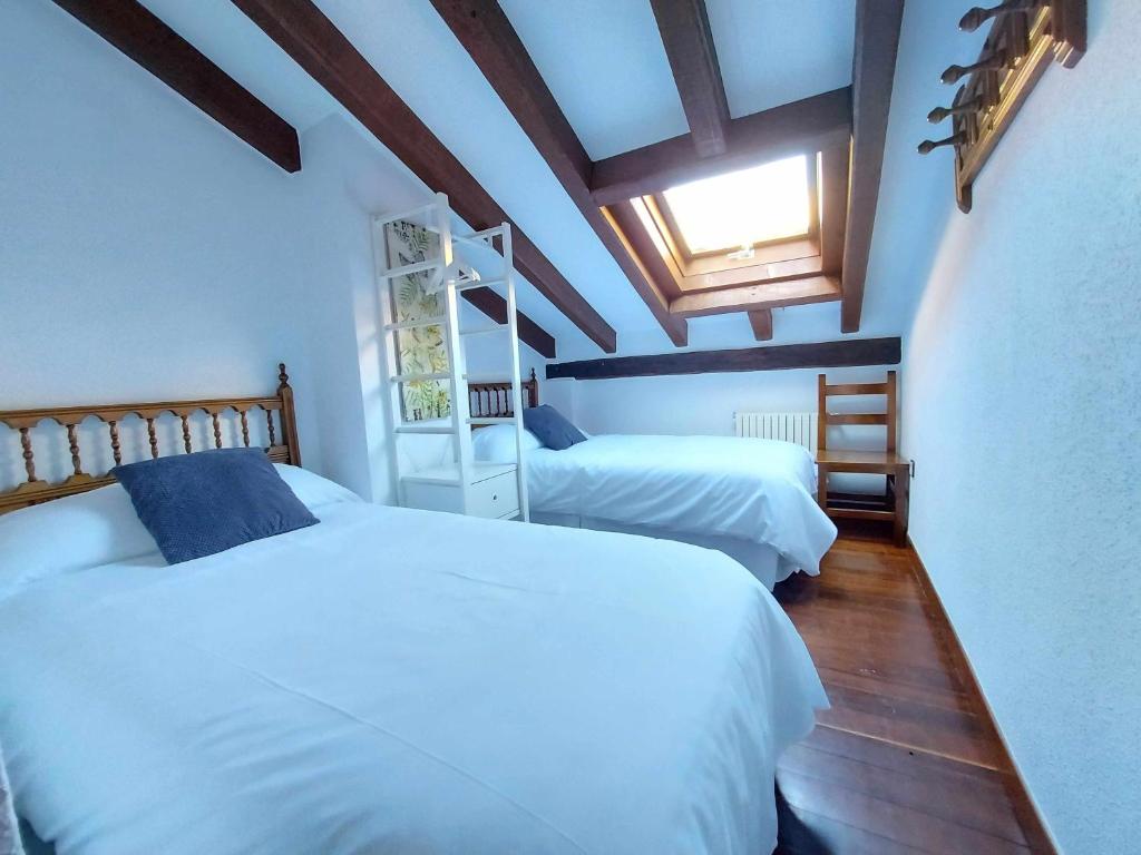 Cama o camas de una habitación en Apartamentos Nevandi
