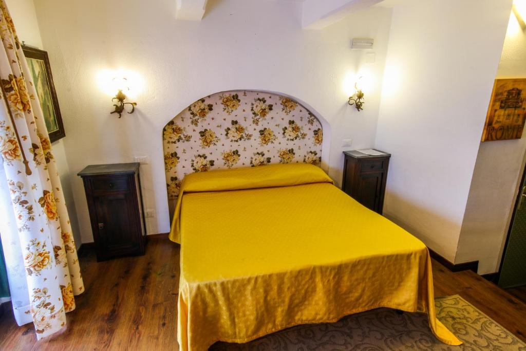 Posteľ alebo postele v izbe v ubytovaní Al Cortiletto
