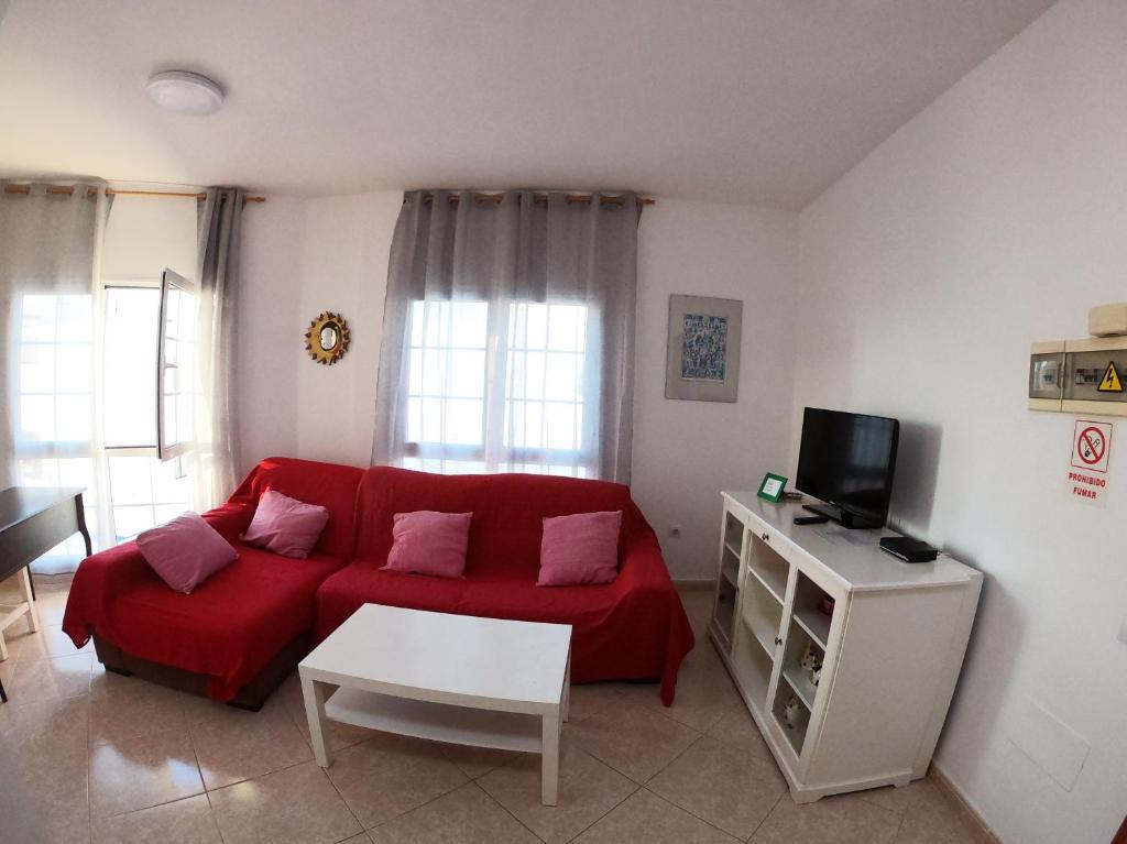 TV a/nebo společenská místnost v ubytování Apartamento vistas al mar, wifi de 600 Mb