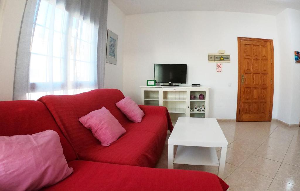 TV a/nebo společenská místnost v ubytování Apartamento vistas al mar, wifi de 600 Mb