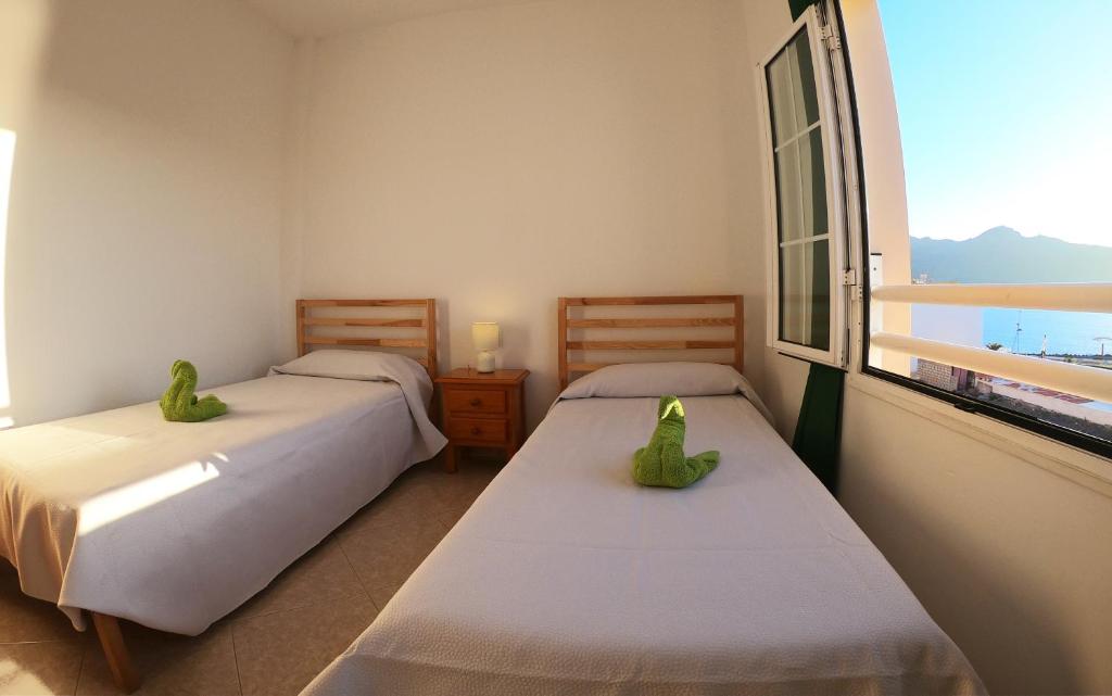 Postel nebo postele na pokoji v ubytování Apartamento vistas al mar, wifi de 600 Mb