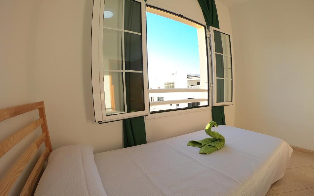Postel nebo postele na pokoji v ubytování Apartamento vistas al mar, wifi de 600 Mb