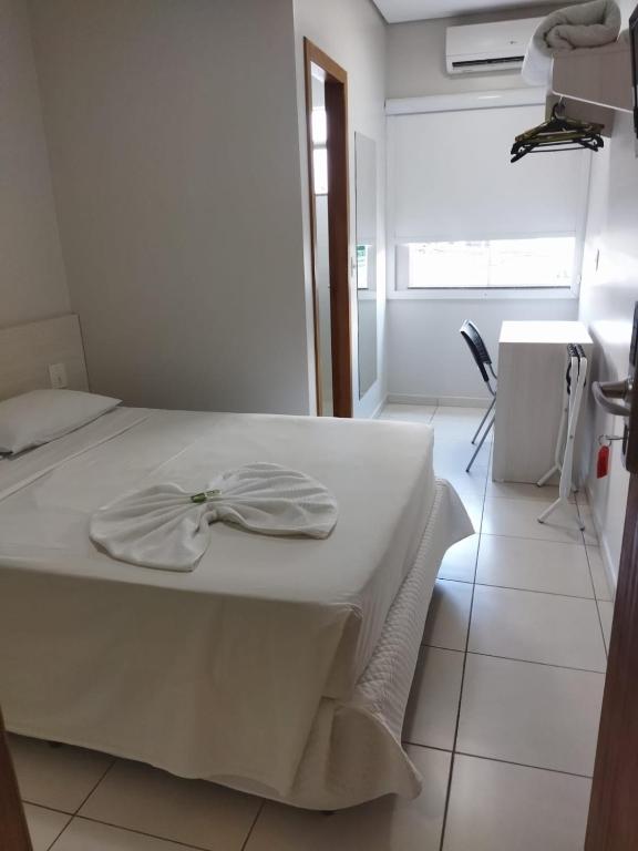 Postel nebo postele na pokoji v ubytování MFG Hotel