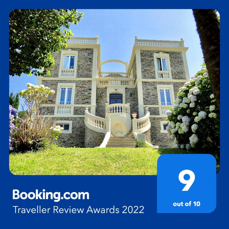 a picture of a house with the number on it at Villa Auristela in Navia