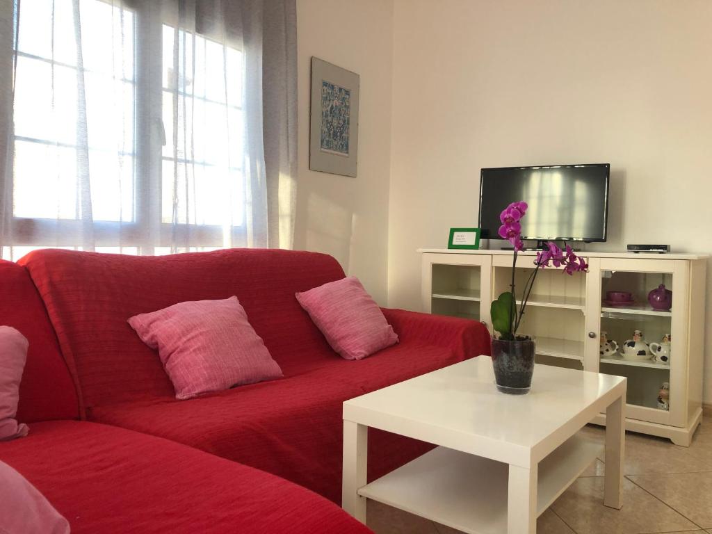 TV a/nebo společenská místnost v ubytování Apartamento vistas al mar, wifi de 600 Mb