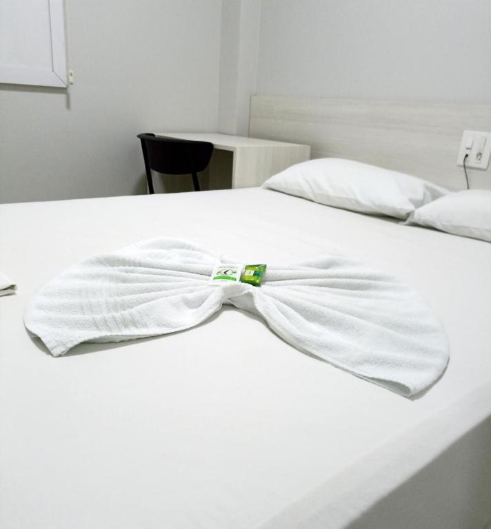 Postel nebo postele na pokoji v ubytování MFG Hotel