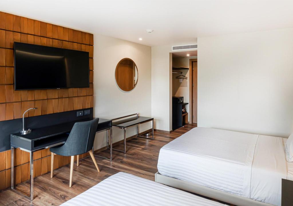 TV a/nebo společenská místnost v ubytování Hotel Real del Rio