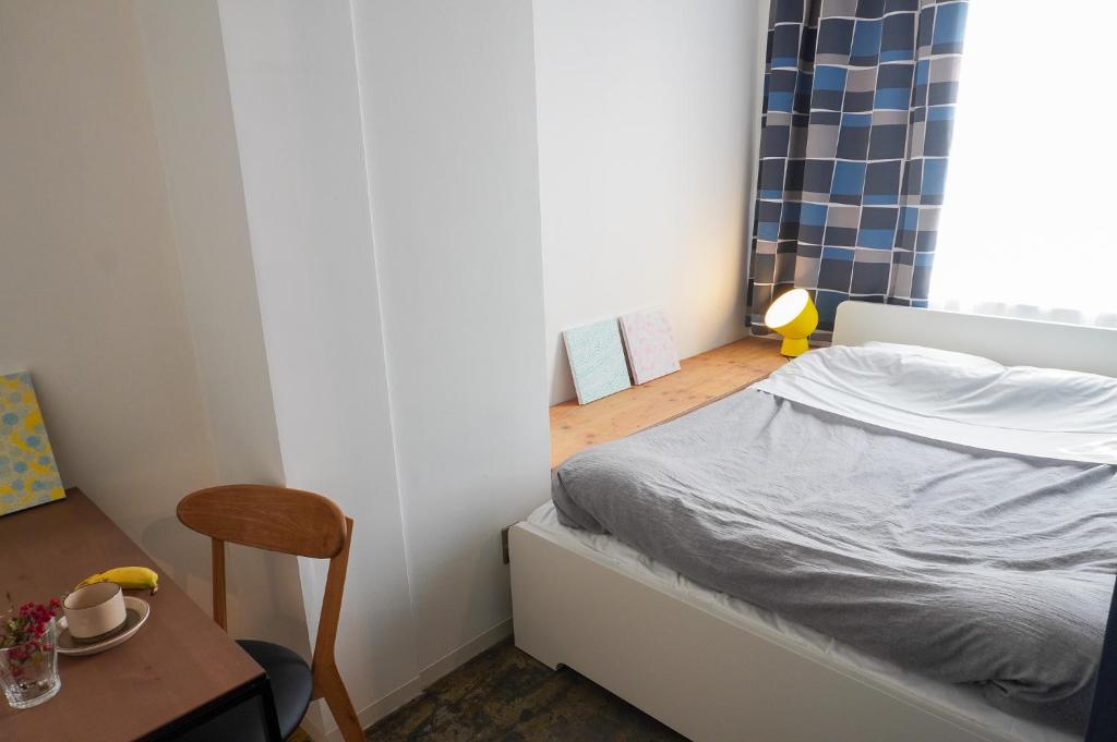 Postel nebo postele na pokoji v ubytování Hostel Niniroom