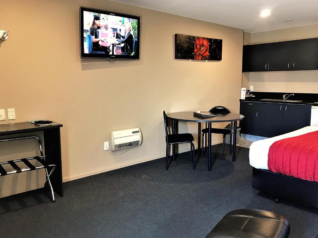 TV a/nebo společenská místnost v ubytování Phoenix Motels