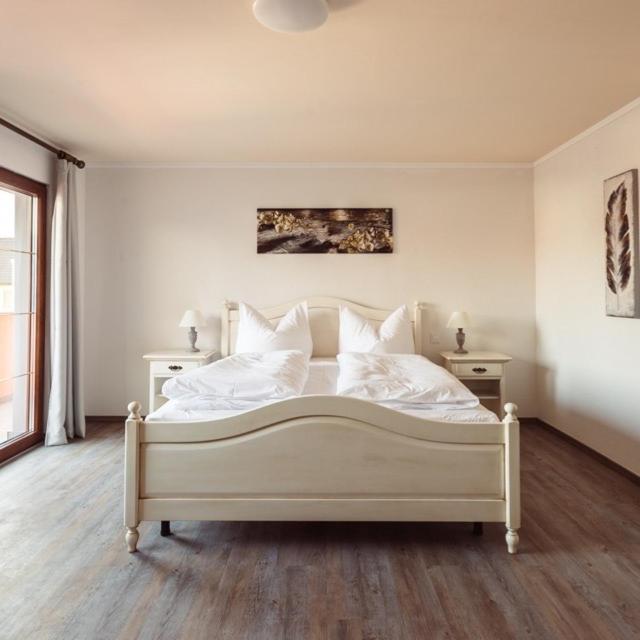 Postel nebo postele na pokoji v ubytování Hotel Roma