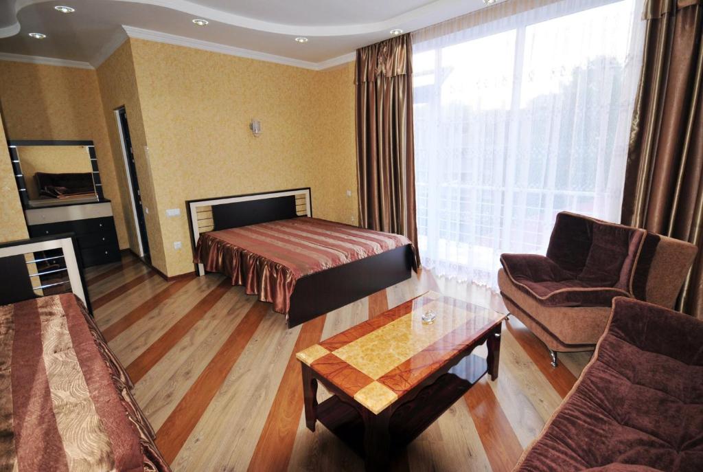 Postel nebo postele na pokoji v ubytování Hotel Albatros