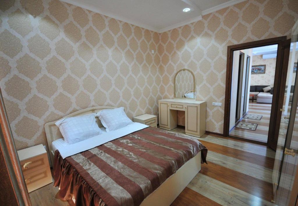Postel nebo postele na pokoji v ubytování Hotel Albatros