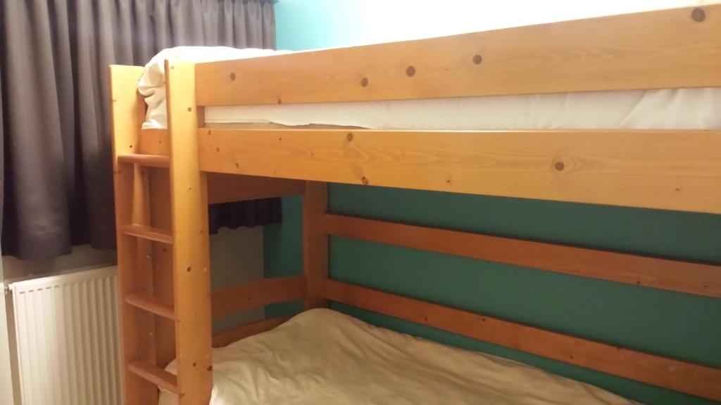 Postel nebo postele na pokoji v ubytování Domein Westhoek Apartment