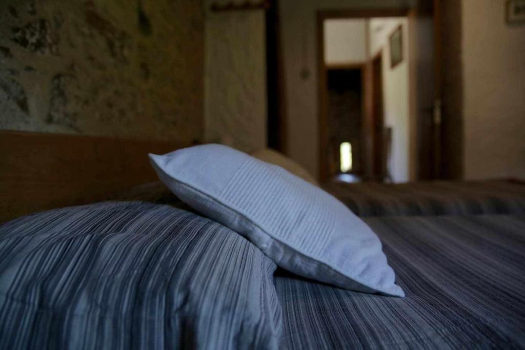 Postel nebo postele na pokoji v ubytování La cabanya de Can Planes un petit gran espai