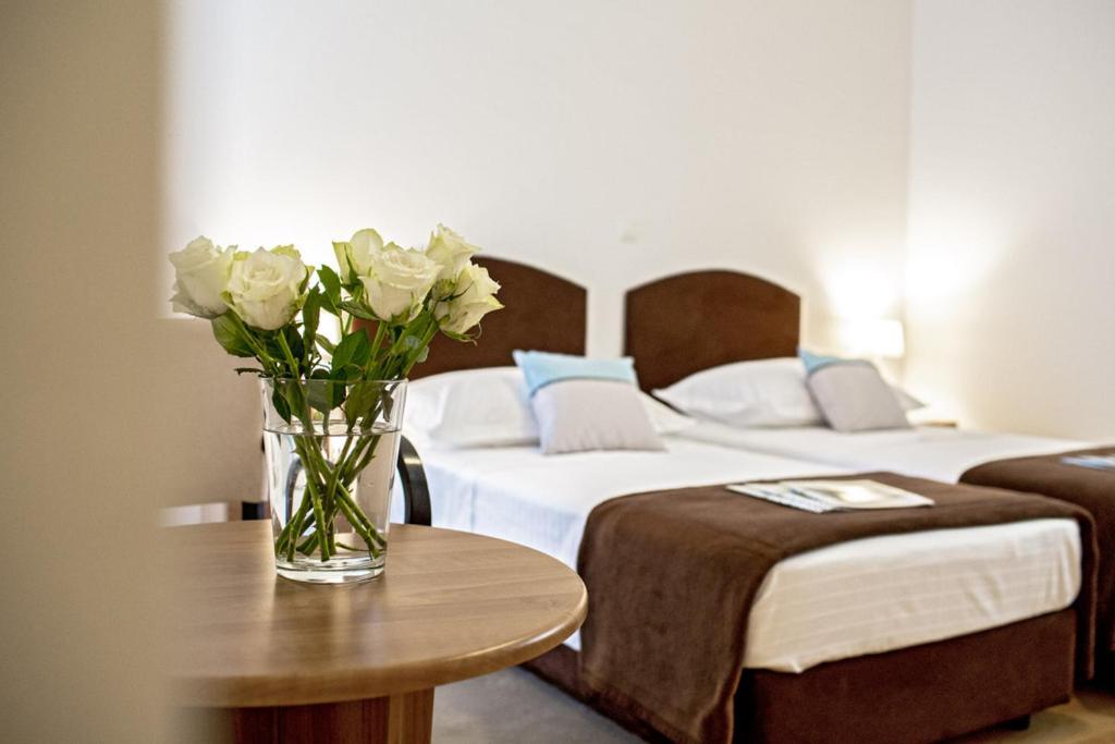 Posteľ alebo postele v izbe v ubytovaní Rooms Margarita