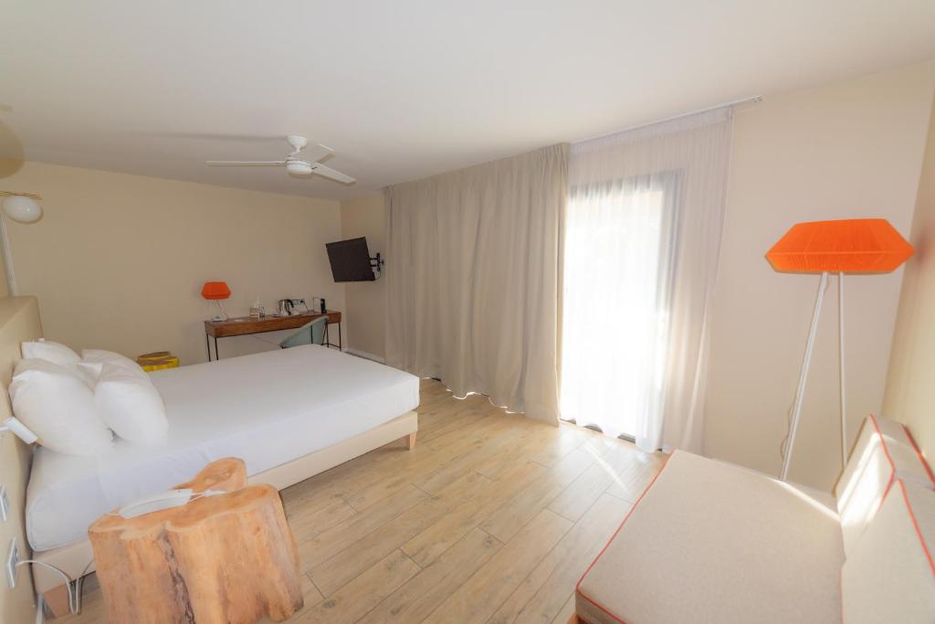 Postel nebo postele na pokoji v ubytování Boutik Hôtel 2A - Adult Only