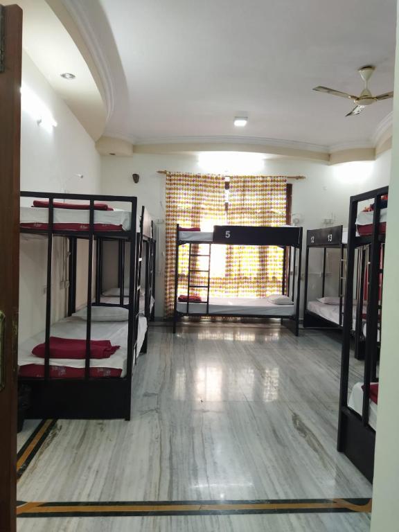 Letto o letti in una camera di KyGo Hostels