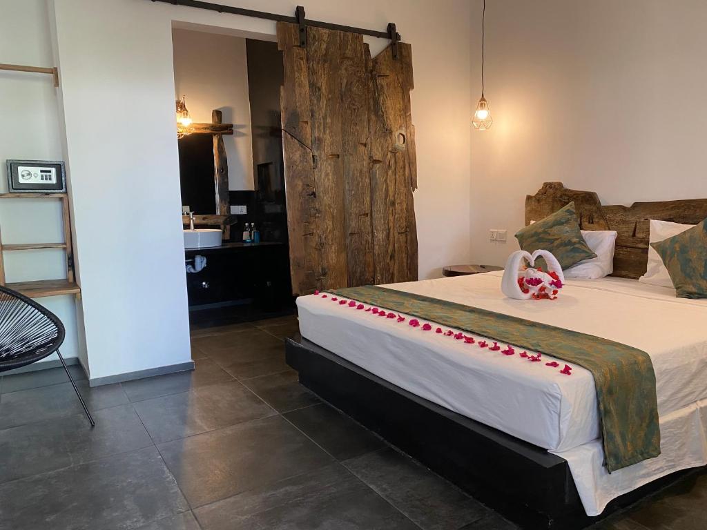 Postel nebo postele na pokoji v ubytování Opera Hotel