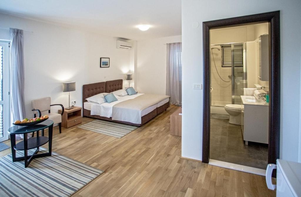 Posteľ alebo postele v izbe v ubytovaní Rooms Margarita