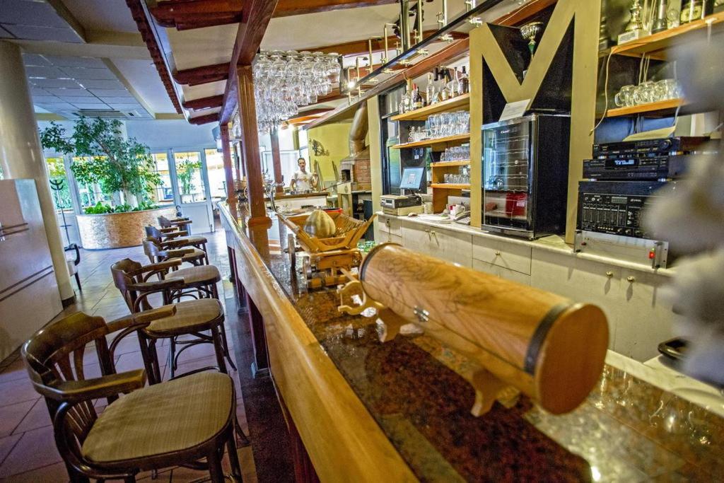 Reštaurácia alebo iné gastronomické zariadenie v ubytovaní Rooms Margarita