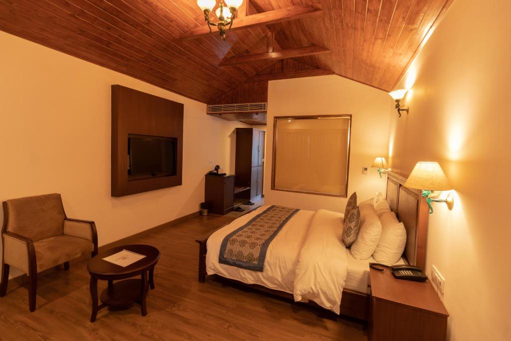 Postel nebo postele na pokoji v ubytování Aloka Resort