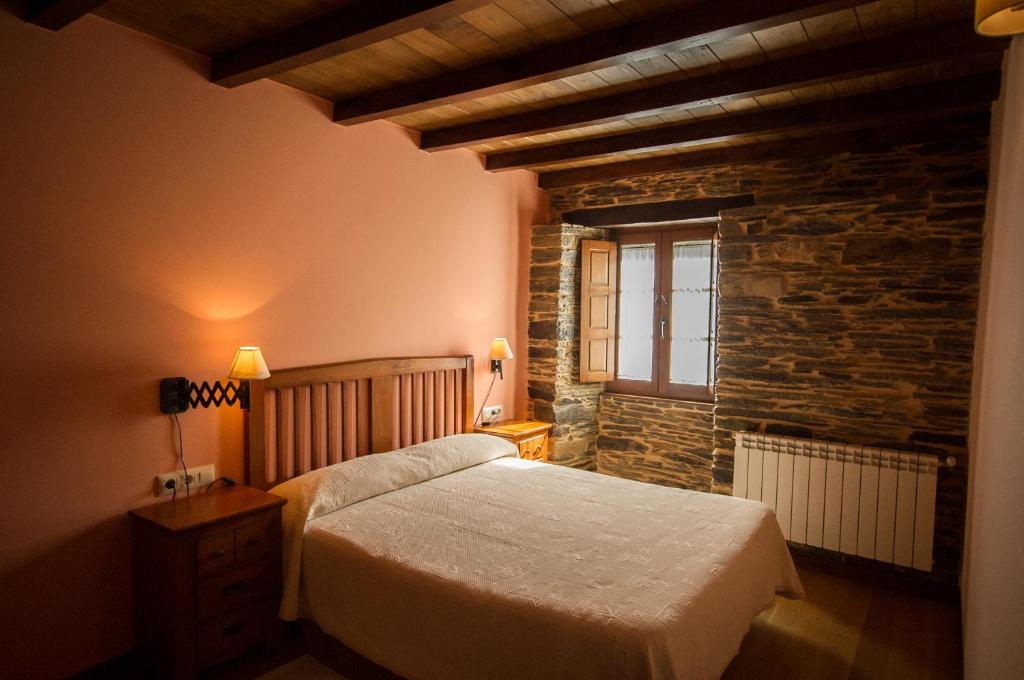 Postel nebo postele na pokoji v ubytování Apartamentos El Sualleiro