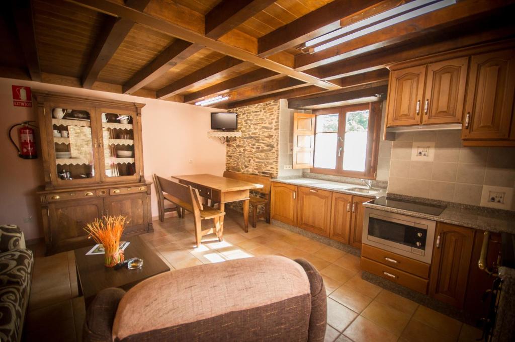 Kuchyň nebo kuchyňský kout v ubytování Apartamentos El Sualleiro