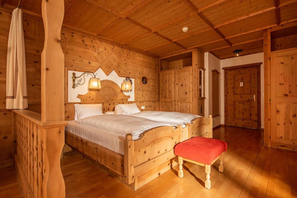 Postel nebo postele na pokoji v ubytování Schlosshotel Chastè