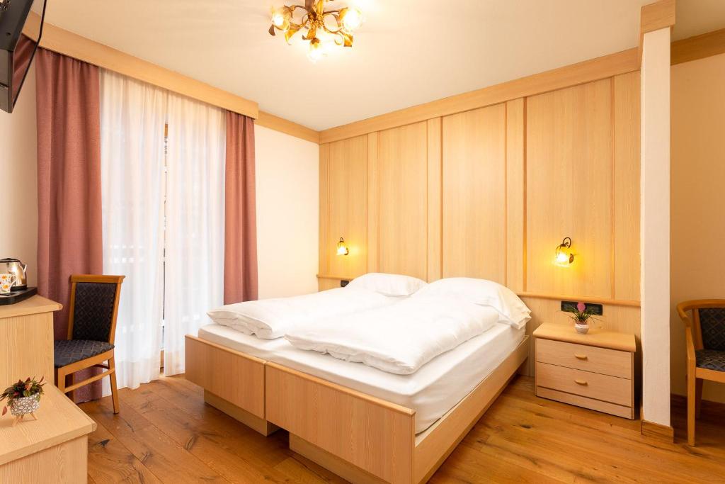 Postel nebo postele na pokoji v ubytování Hotel Pareda