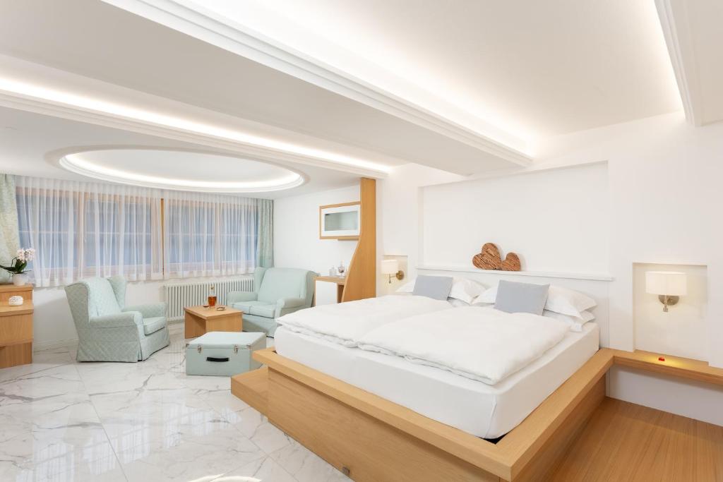 Postel nebo postele na pokoji v ubytování Hotel Pareda