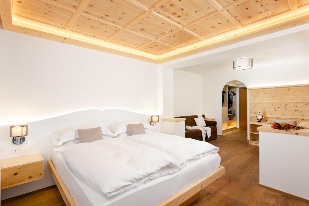 Postel nebo postele na pokoji v ubytování Hotel Pareda