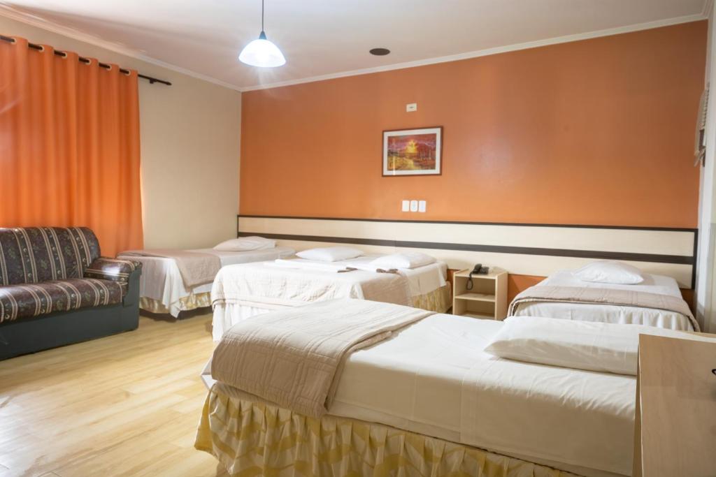 Postel nebo postele na pokoji v ubytování Seibt Palace Hotel