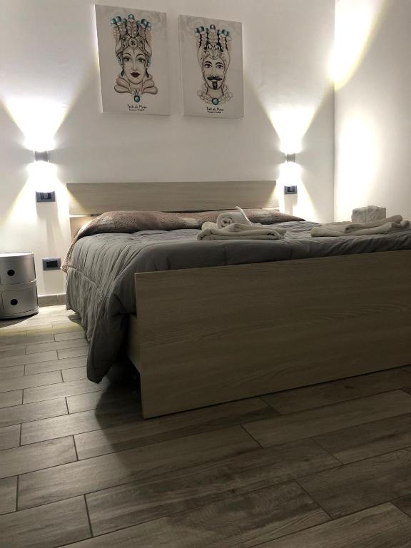 Łóżko lub łóżka w pokoju w obiekcie Sunrise Beach Apartment Trapani